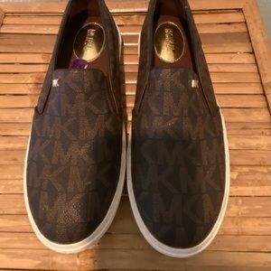 Michael Kors slip ons.